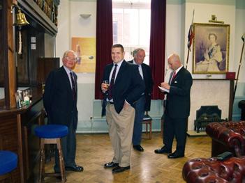 A picture of an exchange officer with UK members in the Mess